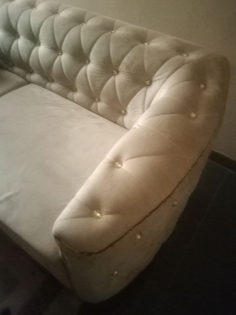 Blanc couch with buttons